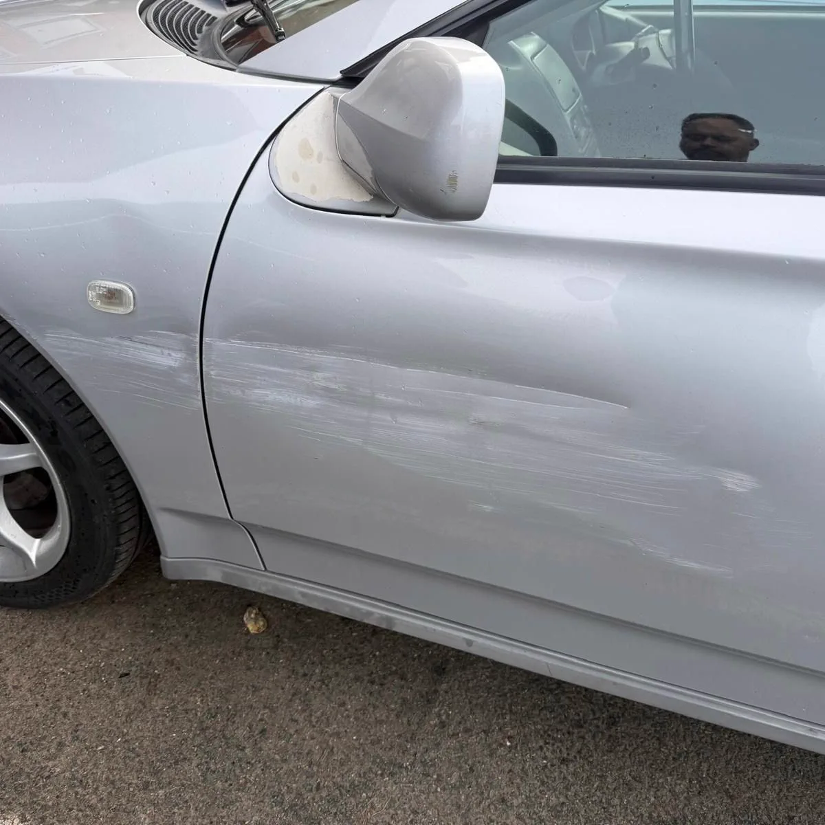 Silver door repair before repair