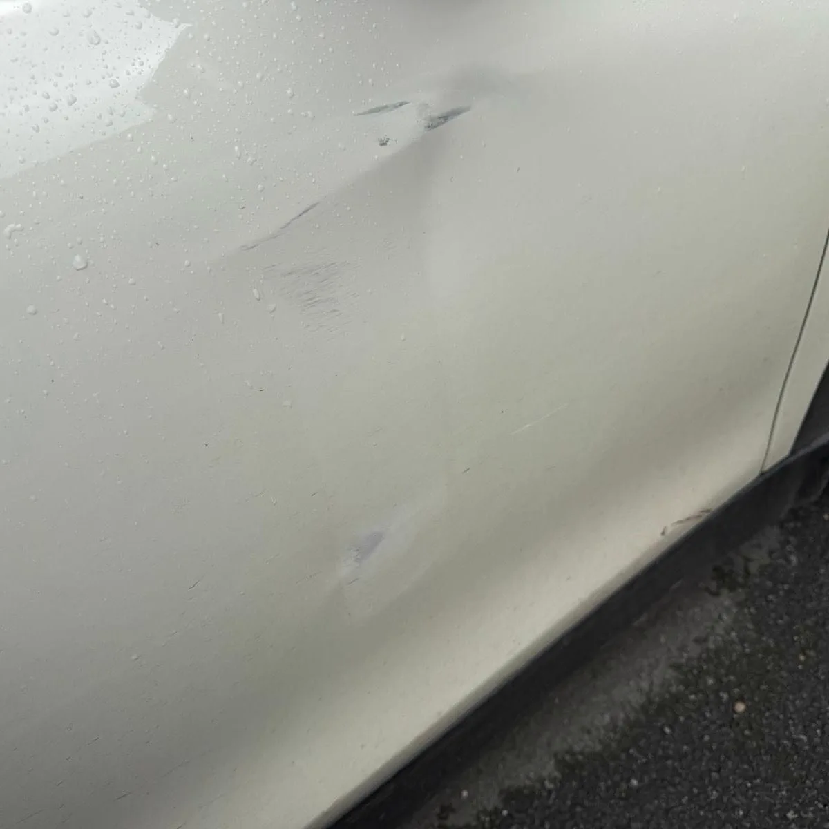 White door dent repair before repair